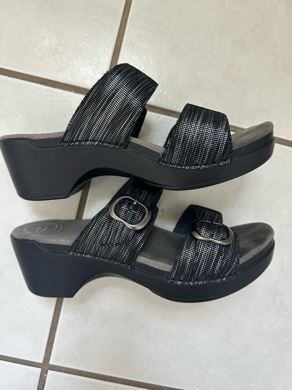 Dansko Wedge Sandals with Buckle. Great shoe but wrong fit for me. Worn twice!
